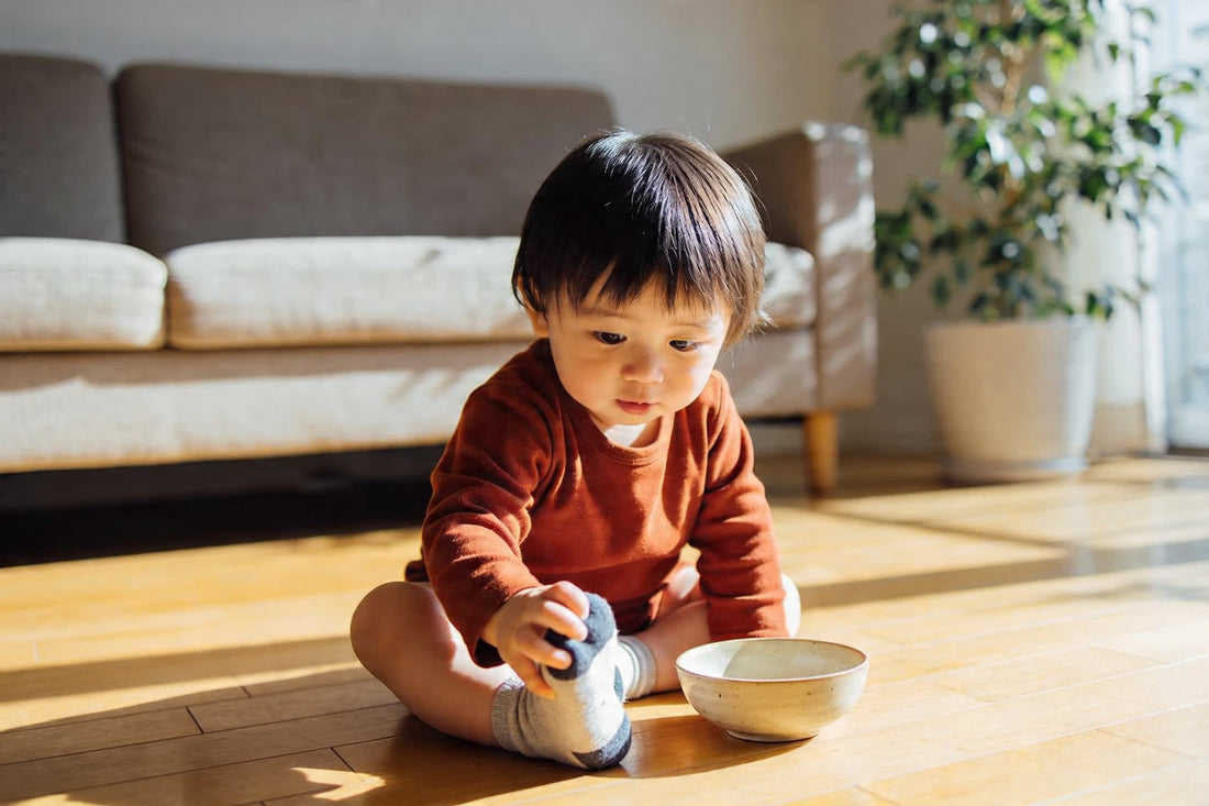 8 Montessori Activities for 1 Year Olds Using Household Items